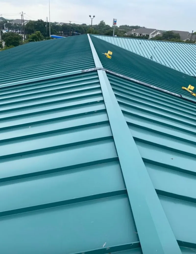 Green commercial metal roof ridge and valley for Metal Roof Repair in Punta Gorda